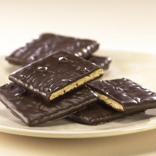Pile of dark chocolate covered graham crackers OU-Dairy